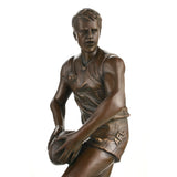 Bronze AFL player statue in action on marble base