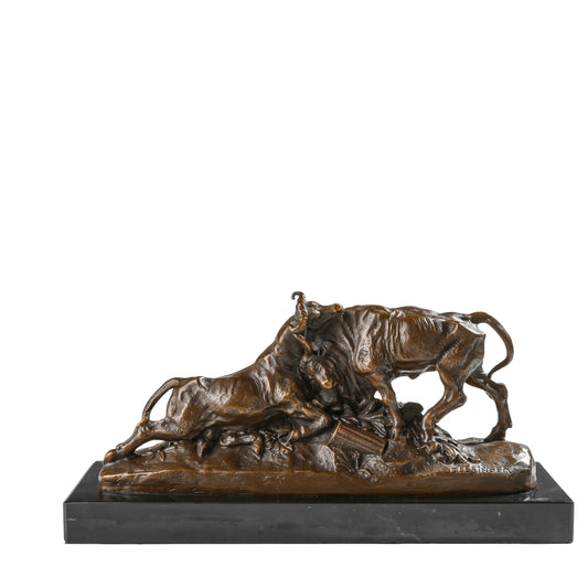 Bronze sculpture of two bulls fighting with dynamic movement and detailed musculature