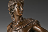 Close-up detail of Apollo bronze sculpture face and hair