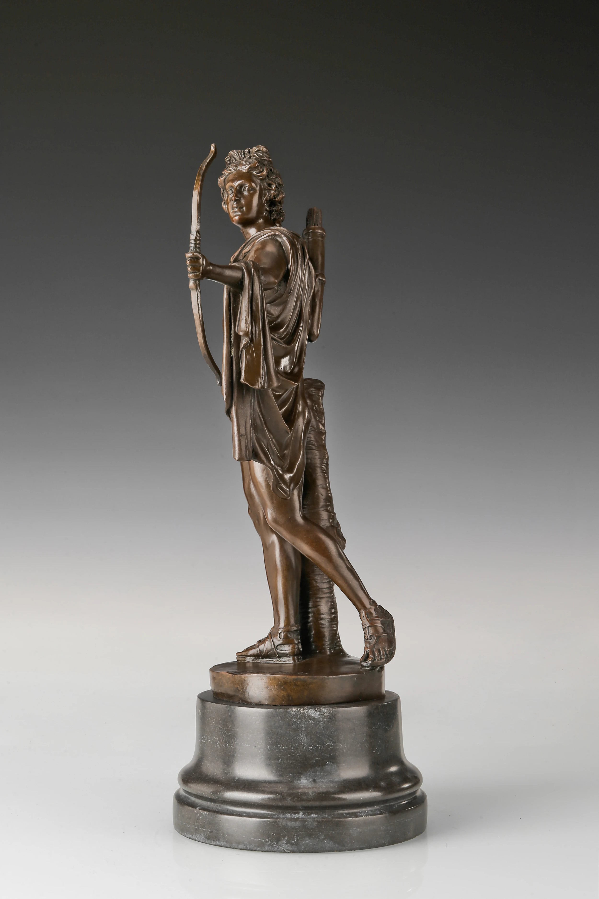 Left side view of Apollo Greek god bronze sculpture