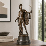Apollo bronze sculpture displayed in a luxury classical interior