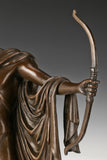 Detailed view of Apollo bronze sculpture holding bow