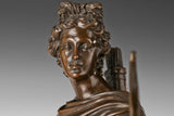 Close-up detail of Apollo bronze statue face and hair
