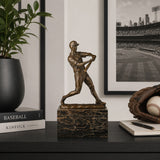 Baseball Batter Bronze Sculpture displayed in a modern interior