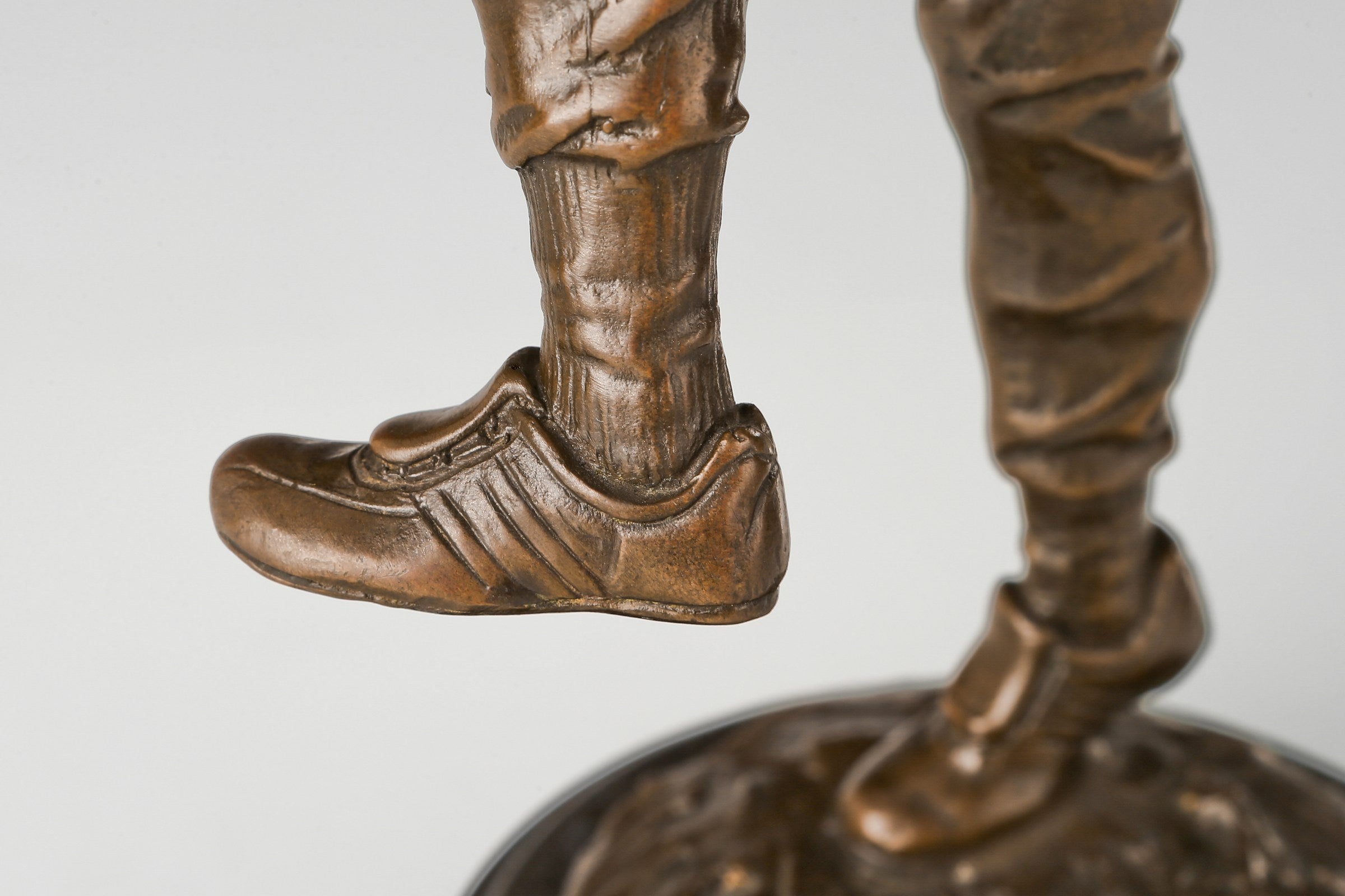 Baseball Pitcher bronze sculpture, base and lower figure detail