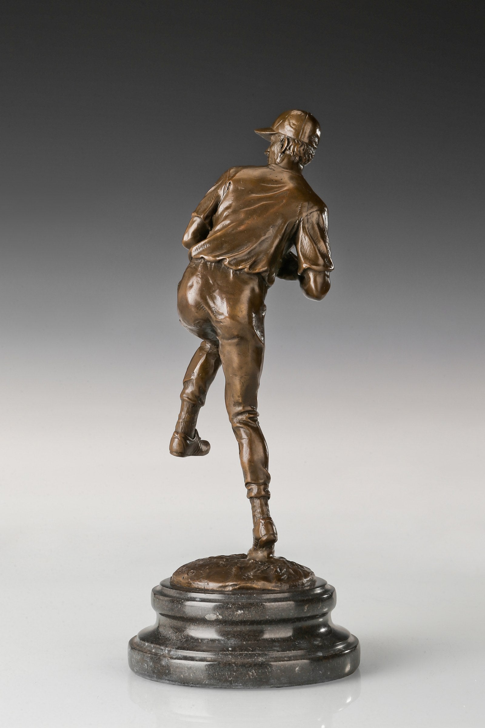 Baseball Pitcher bronze sculpture, rear studio view