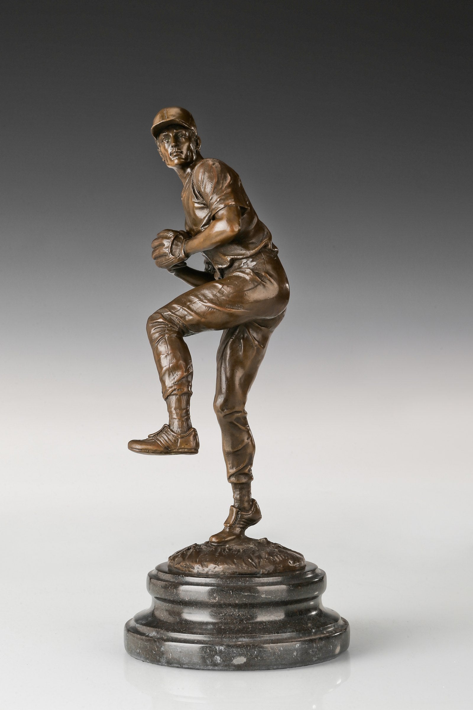 Baseball Pitcher bronze sculpture, side studio view