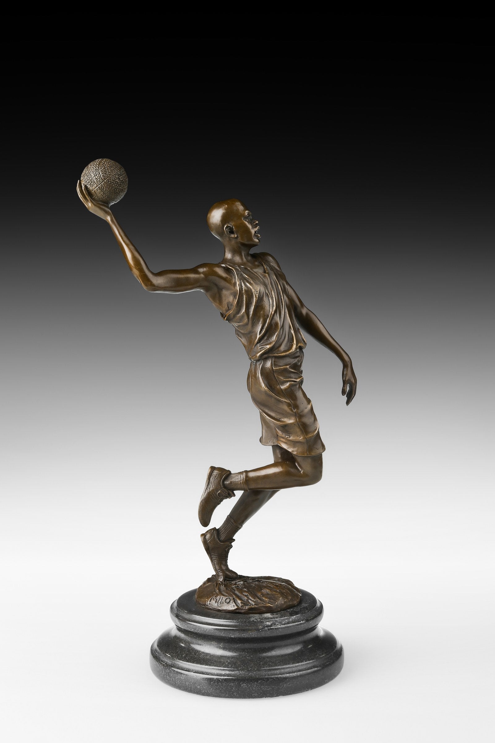 Basketball Player bronze sculpture, opposite-angle studio view