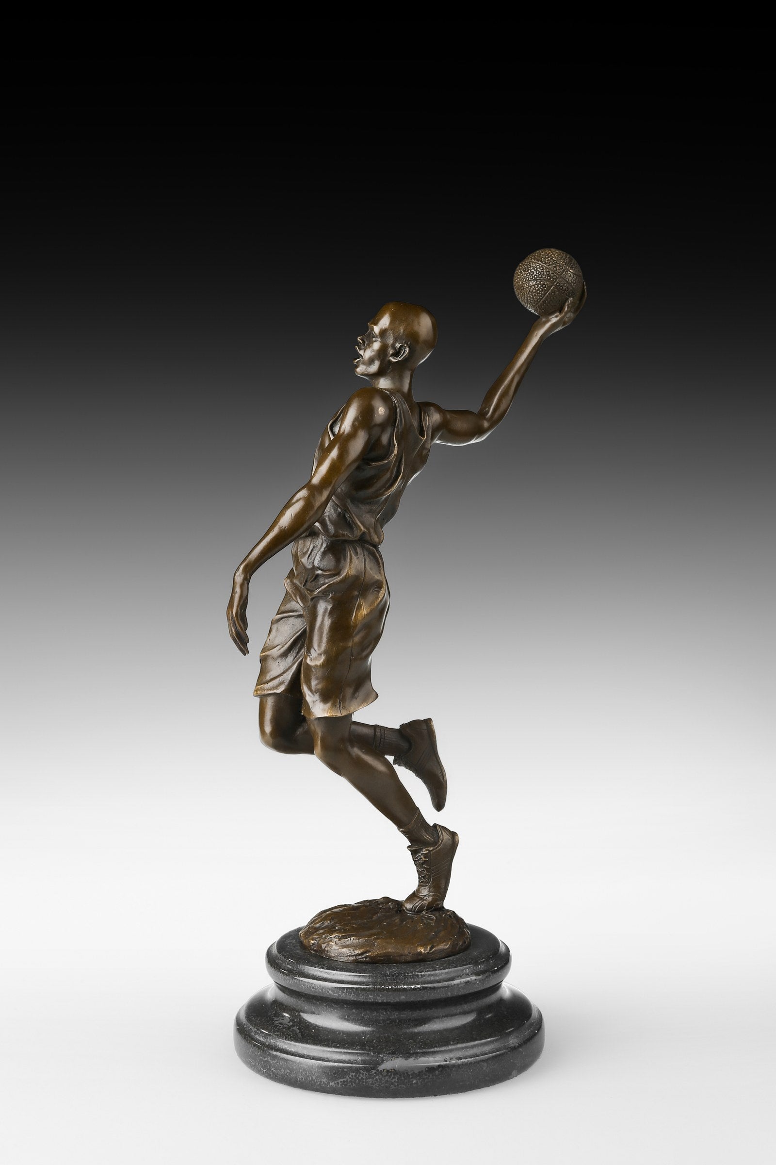 Basketball Player bronze sculpture, side studio view