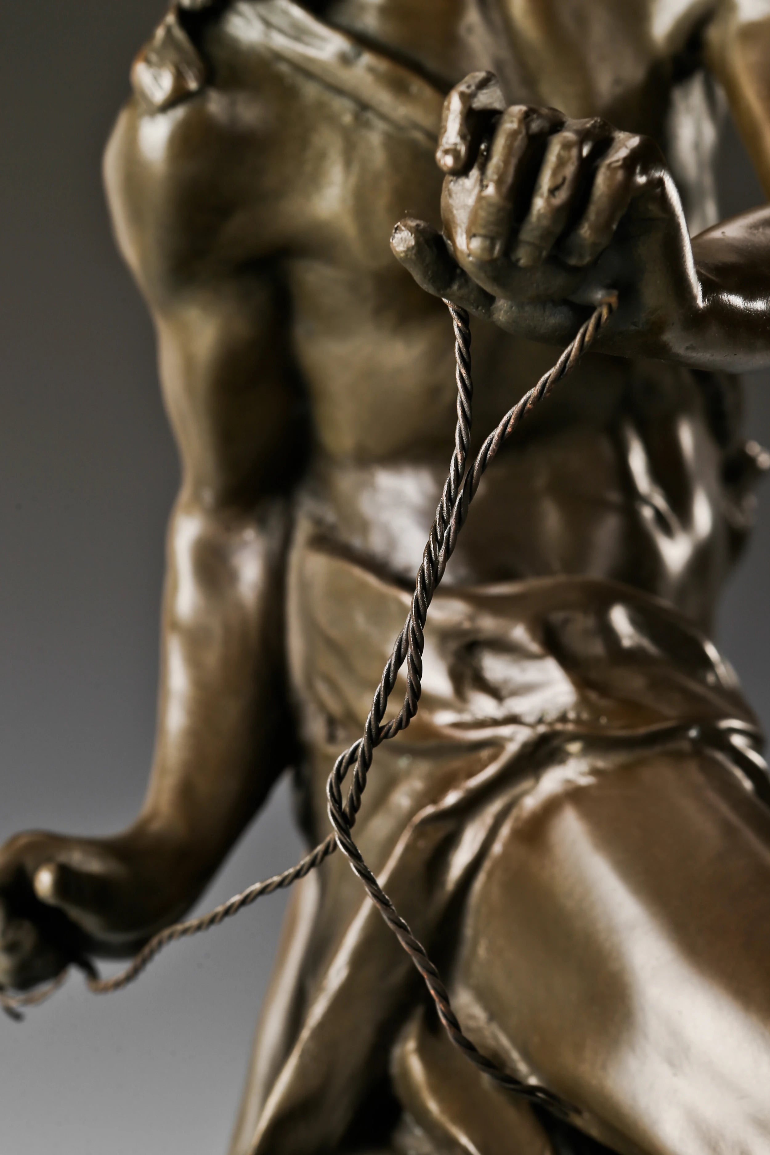 Close-up of the sling, shepherd's pouch, and Goliath's armor details