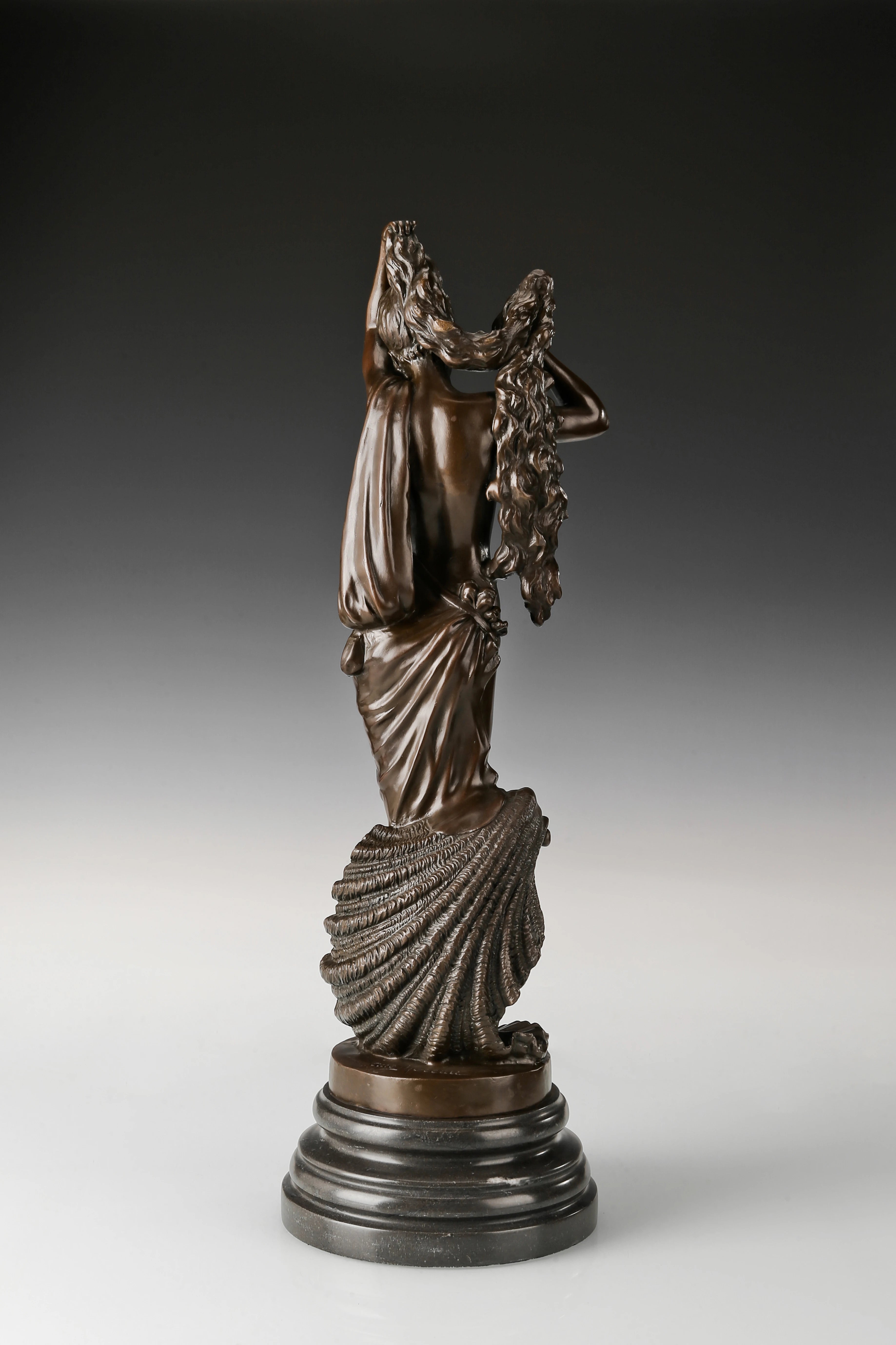 Rear view of Birth of Venus bronze sculpture showing flowing hair and drapery details