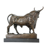 Side view of standing bull showing muscular structure