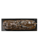 Bronze sculpture of two bulls fighting with dynamic movement and detailed musculature