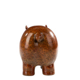 Rear view of handcrafted bronze cartoon cow statue