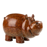 Front right angle of bronze cartoon cow sculpture