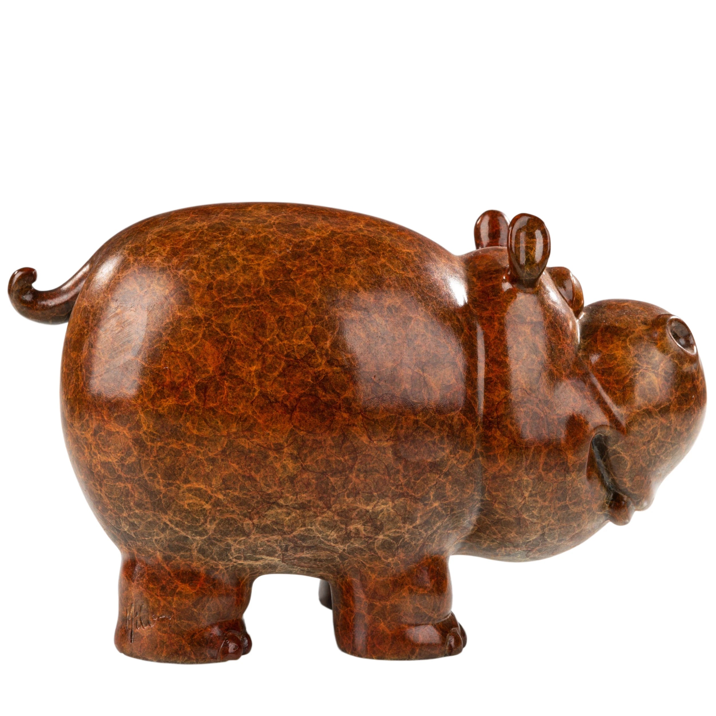 Right side view of modern bronze cow sculpture