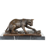 Handcrafted bronze cat and butterfly sculpture showing a playful cat reaching toward a butterfly