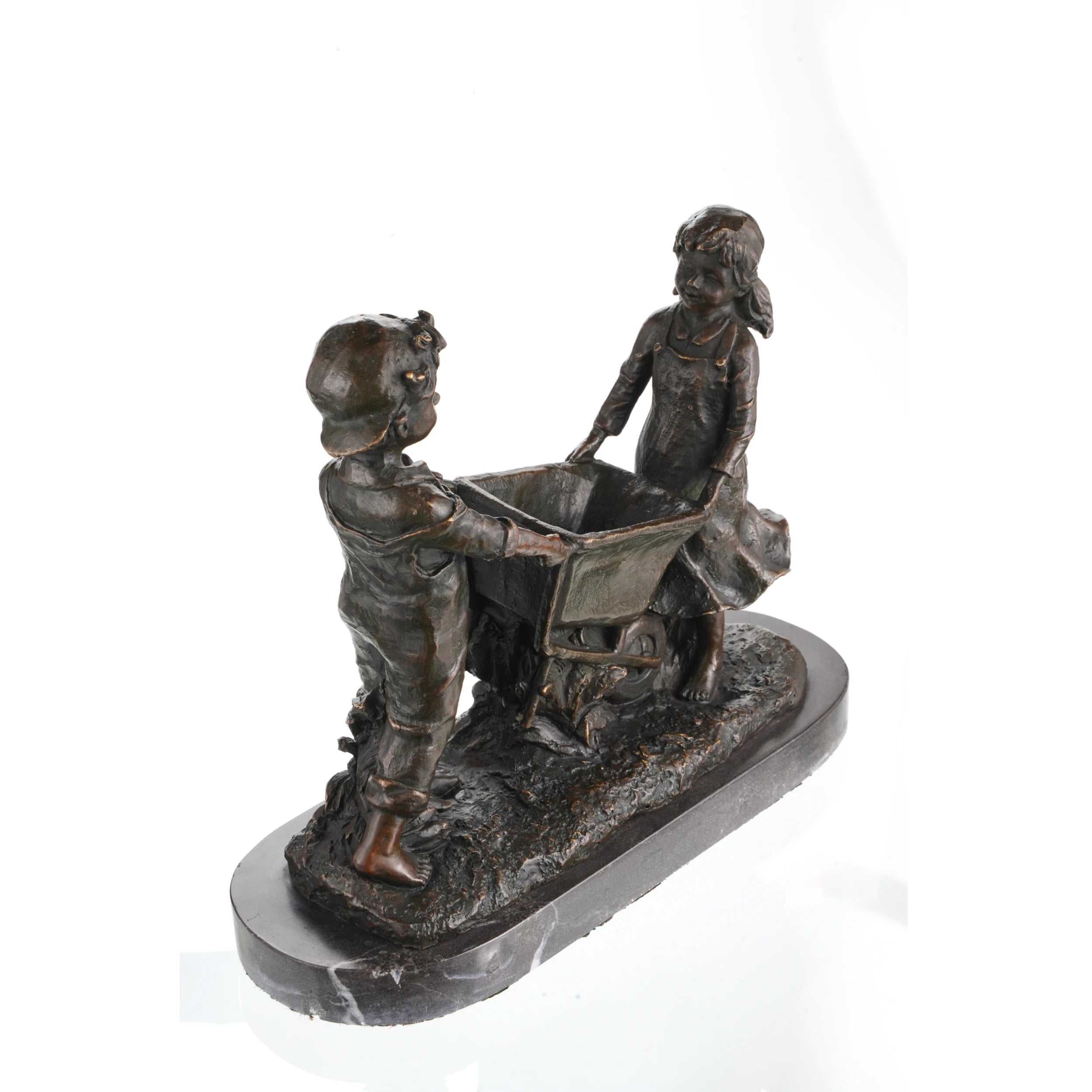Right side view of handcrafted bronze boy and girl wheelbarrow sculpture.