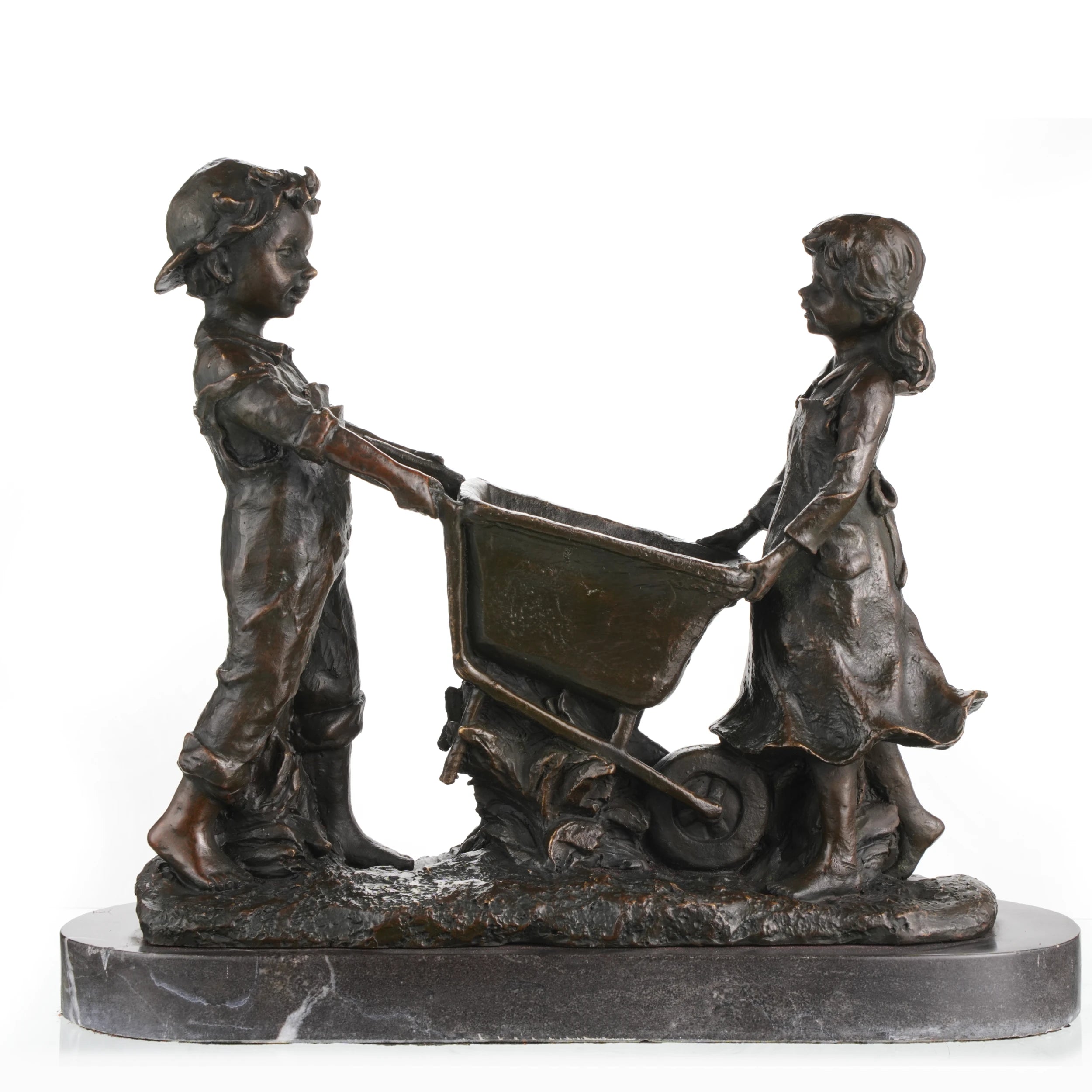 Nostalgic bronze sculpture of a boy and girl with a wheelbarrow on black marble base, heartwarming children playing art for home decor.