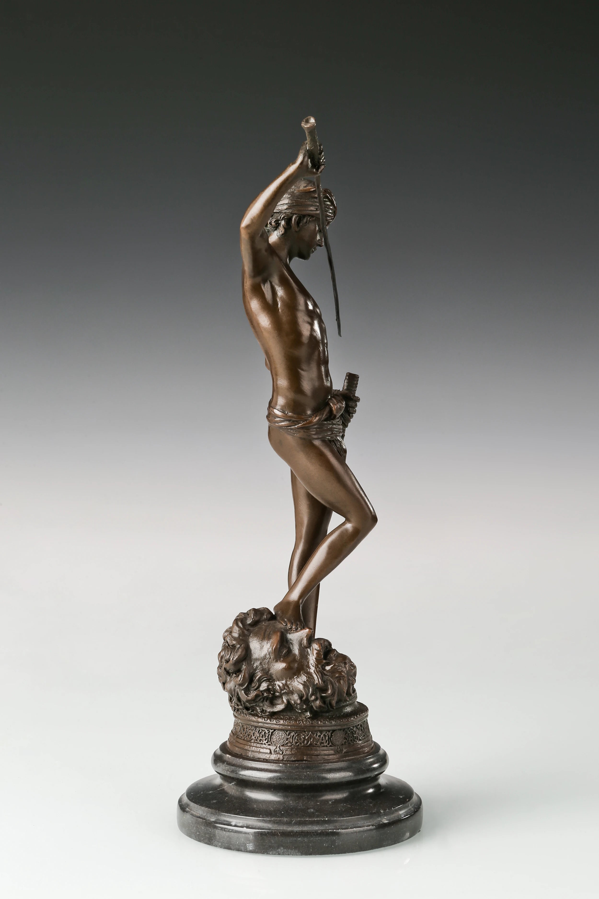 Right side view of handcrafted bronze David hero statue