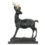 Handcrafted bronze deer sculpture featuring a standing stag with detailed antlers