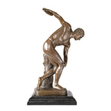 Side view of a solid bronze Discobolus sculpture on a polished marble base