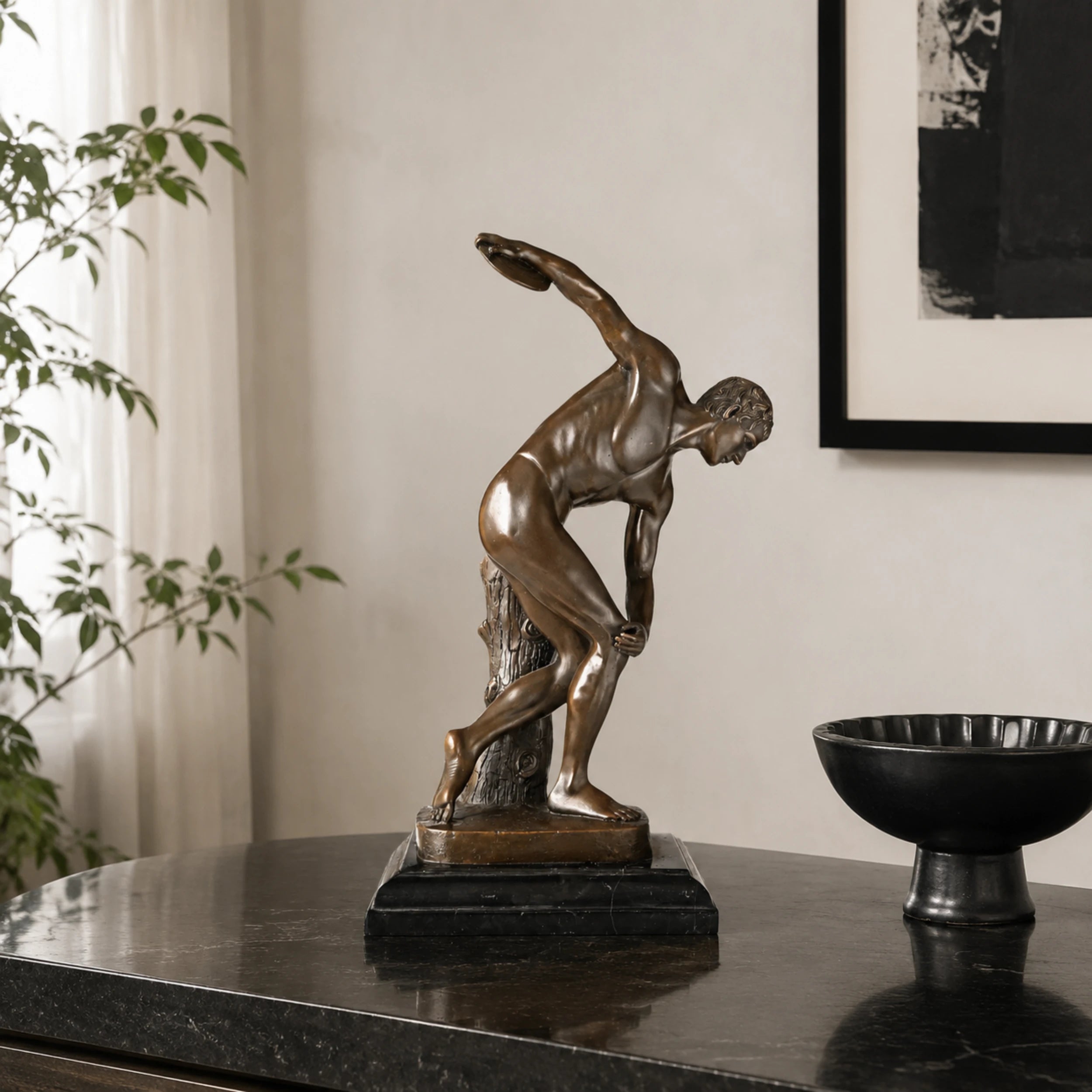 Handcrafted bronze Discobolus statue inspired by the classical Greek discus thrower