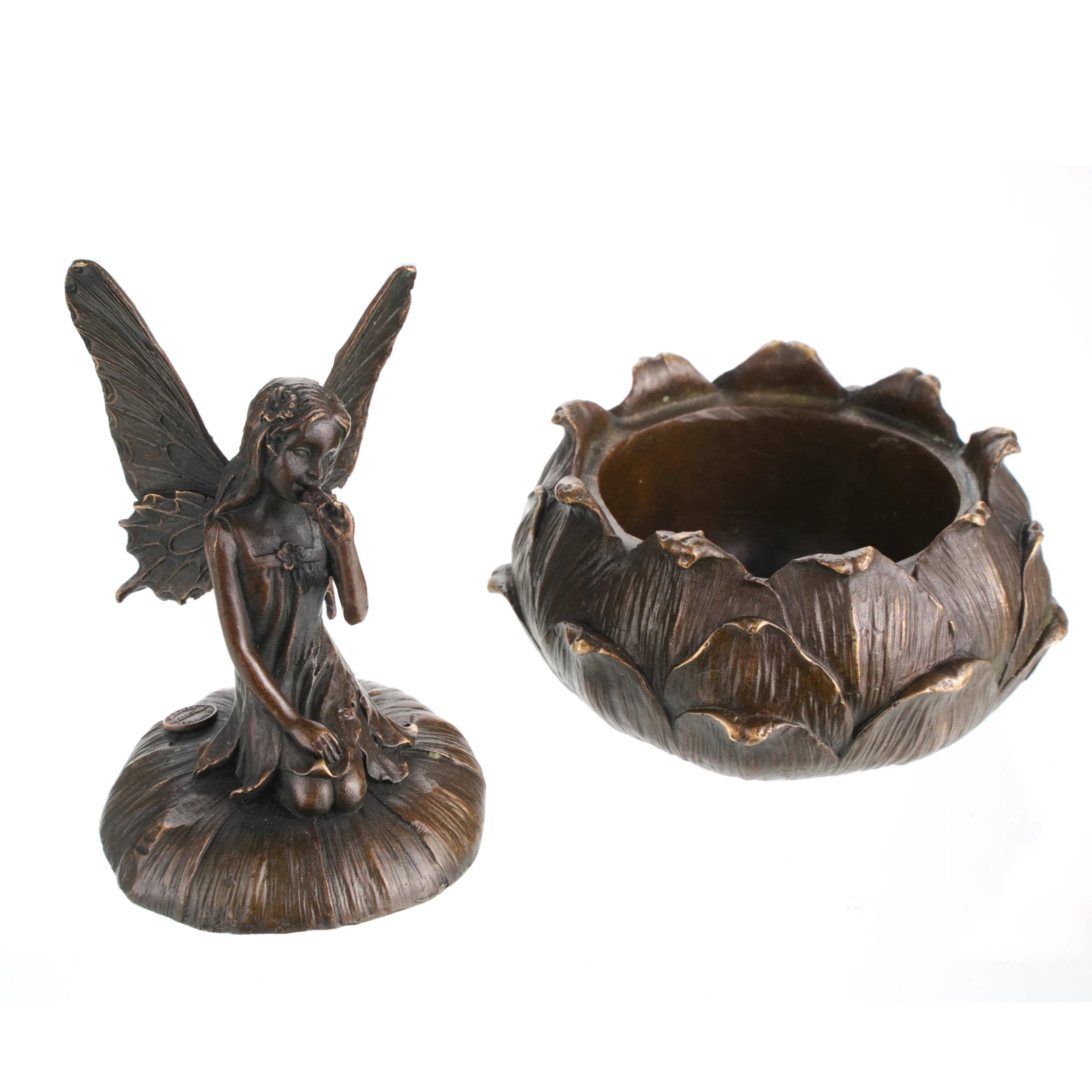 Close-up detail of fairy sculpture with butterfly wings and antique bronze finish