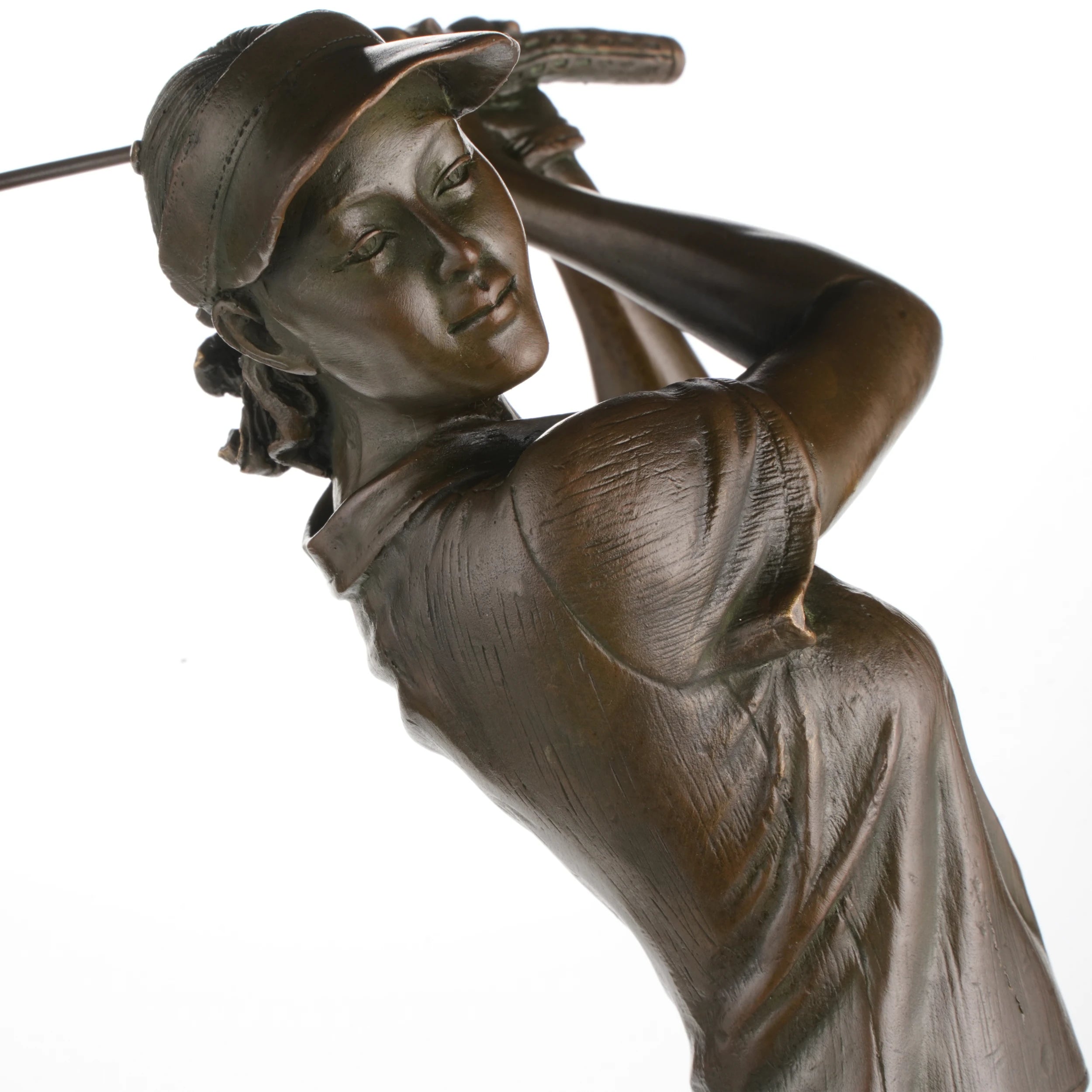 Close-up detail of a handcrafted bronze female golfer sculpture with hand-finished bronze patina and golf club.