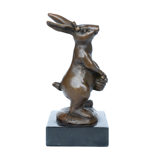 Right side view of handcrafted floral bunny sculpture with detailed ears and rounded form