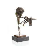 Rear view of a handcrafted bronze flutist sculpture highlighting the openwork artistic composition.