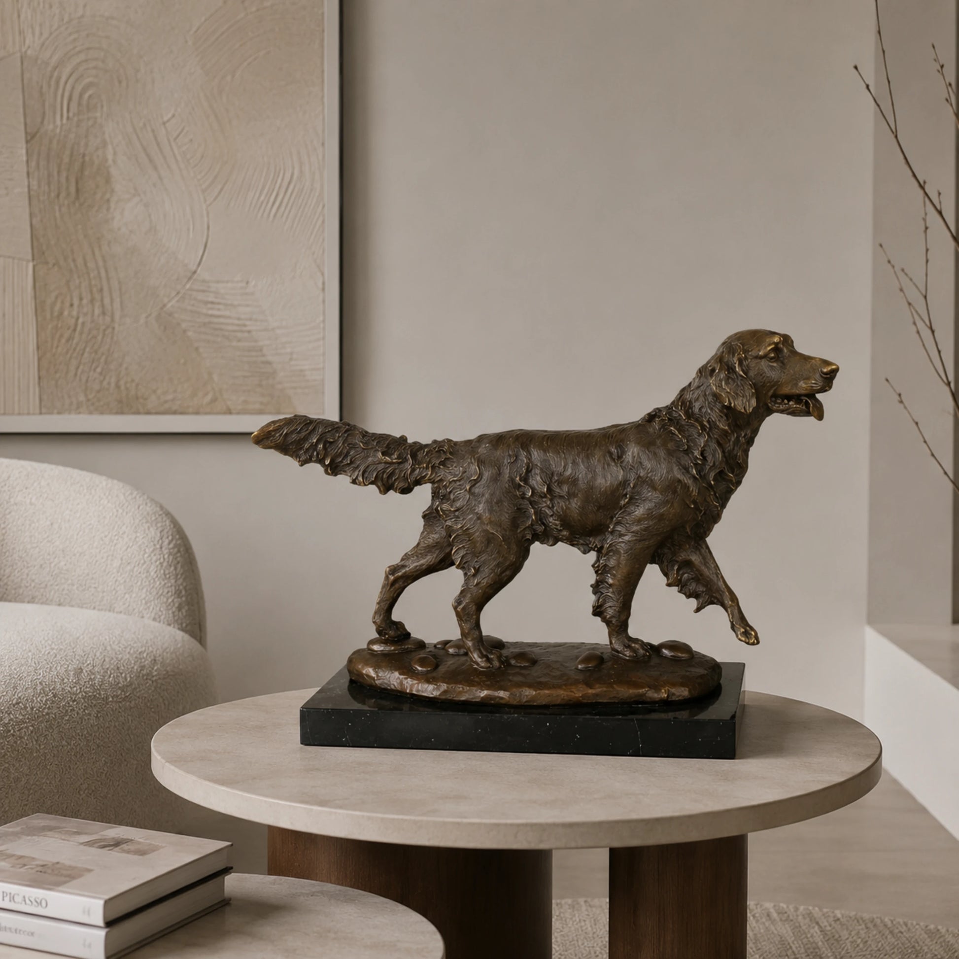 A dynamic bronze golden retriever statue  in mid-stride on pebbled ground, featuring a warm patina and wavy coat texture for home office or library decor.