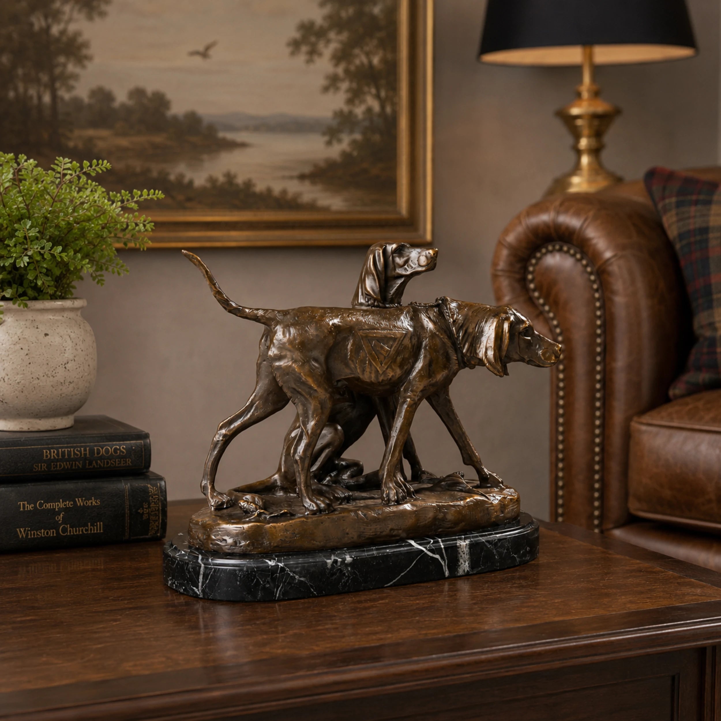 Bronze hunting dog pair sculpture displayed as elegant hunting lodge study and country home decor