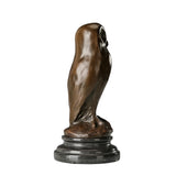 Right side view of handcrafted bronze owl statue with smooth body and refined finish