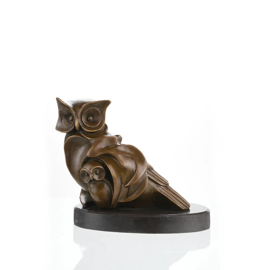 Handcrafted bronze mother and baby owl sculpture in a protective family pose