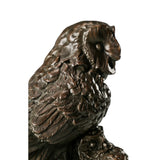 Close-up of layered bronze owl feathers with rich hand-applied patina
