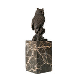 Right side view of handcrafted bronze owl on branch with rich hand-applied patina