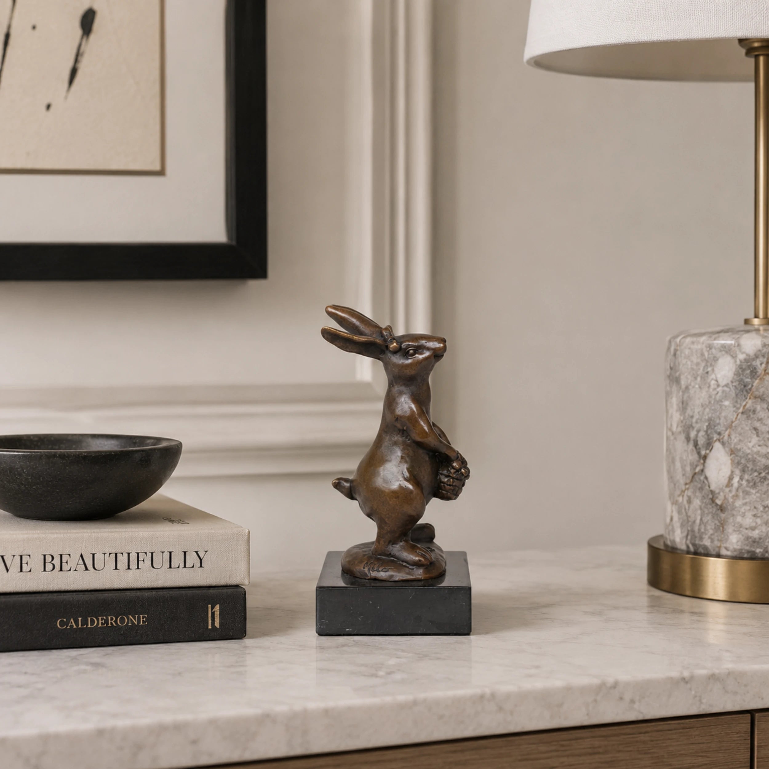 Bronze rabbit with flower basket displayed as charming spring and home decor