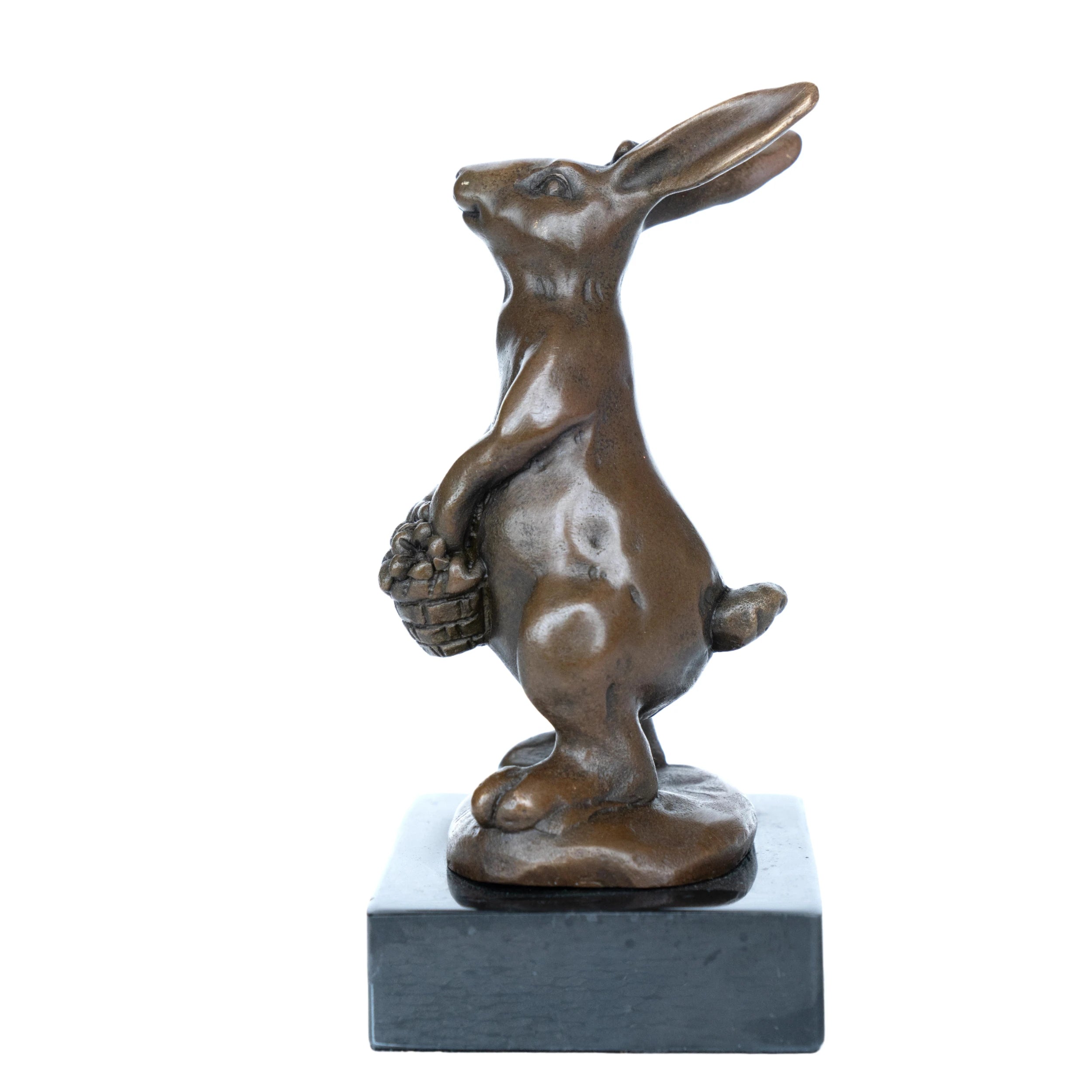 Left side view of bronze rabbit statue holding a basket filled with flowers