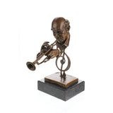 Right side view of a solid bronze musician sculpture featuring a trumpet and musical note.