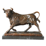 Charging bull bronze sculpture crafted using lost-wax casting. A powerful symbol of strength, determination, and bull market success for office or home decor.