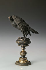 bronze eagle statue with ornate base