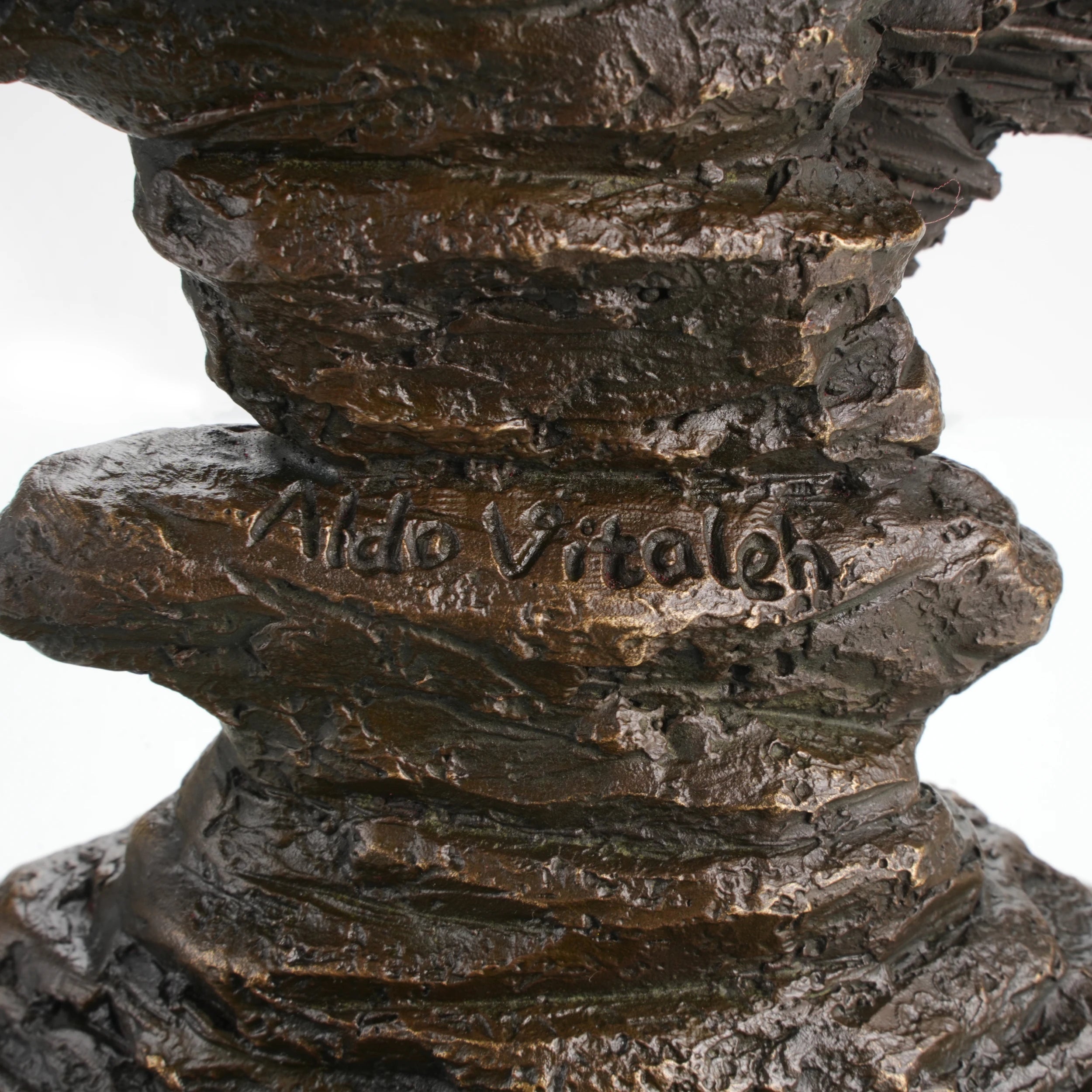 Bronze figurine mounted on round black marble plinth