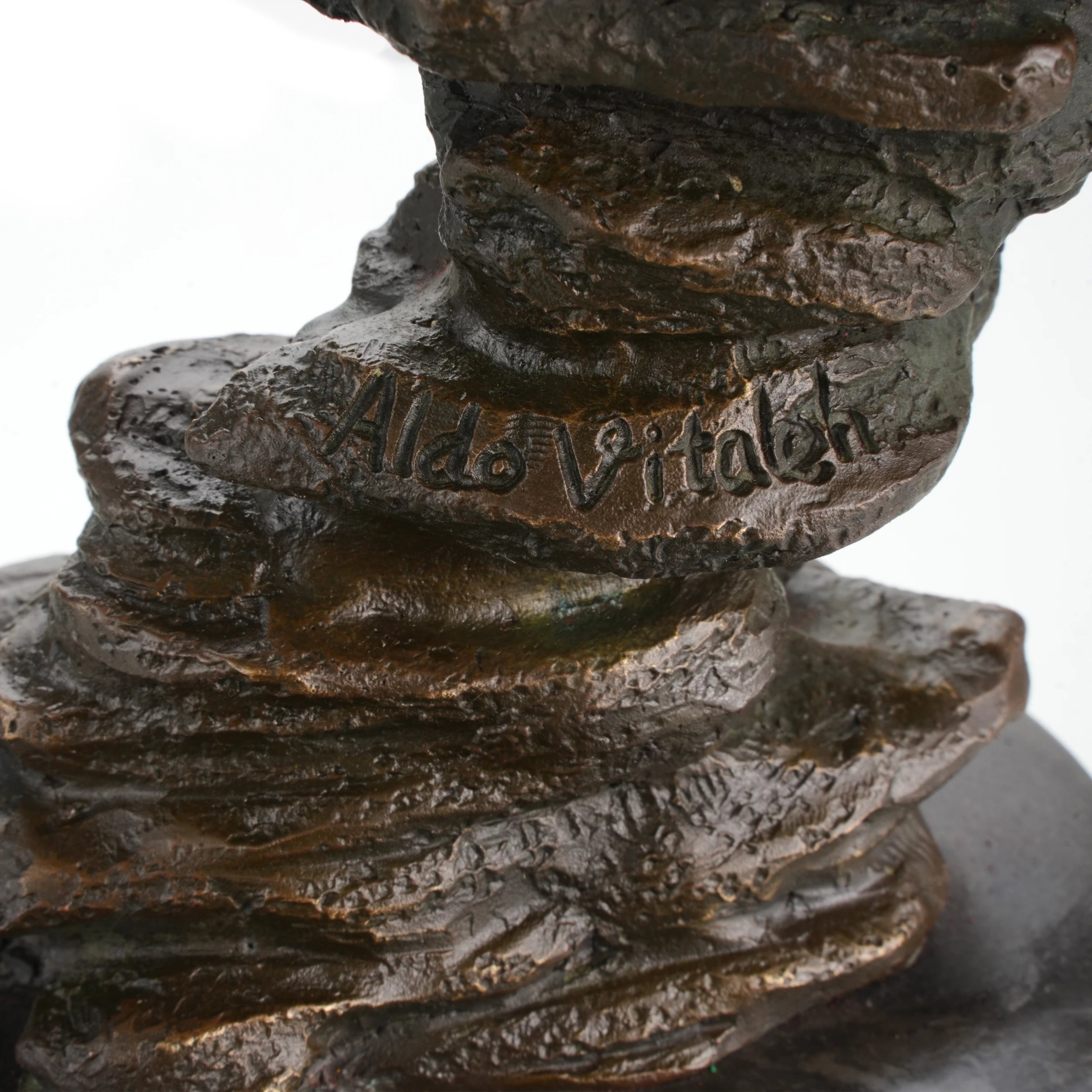 Bronze sculpture mounted on round marble base