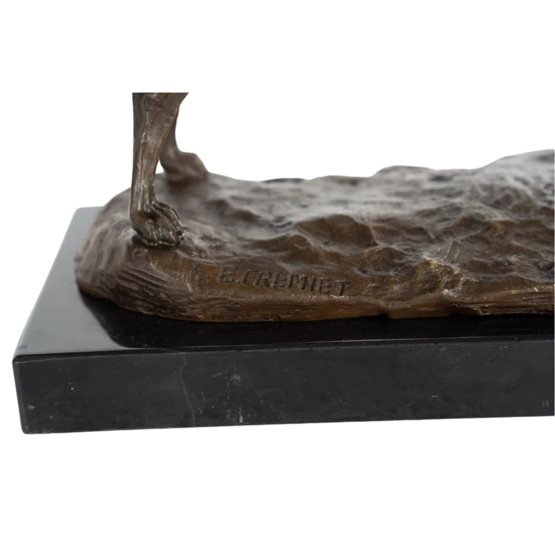 an elegant bronze sculpture of a greyhound, crafted using the lost-wax casting method . The piece captures the dog in a poised, alert stance, with its head held high and body stretched forward, conveying the breed’s characteristic grace, speed, and athleticism. The rich, warm bronze patina accentuates the dog’s lean, muscular physique, the smooth texture of its short coat, and the delicate details of its collar.