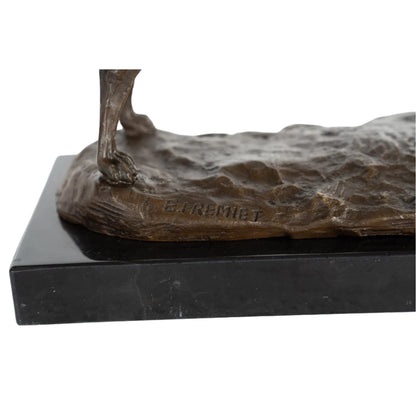 an elegant bronze sculpture of a greyhound, crafted using the lost-wax casting method . The piece captures the dog in a poised, alert stance, with its head held high and body stretched forward, conveying the breed’s characteristic grace, speed, and athleticism. The rich, warm bronze patina accentuates the dog’s lean, muscular physique, the smooth texture of its short coat, and the delicate details of its collar.