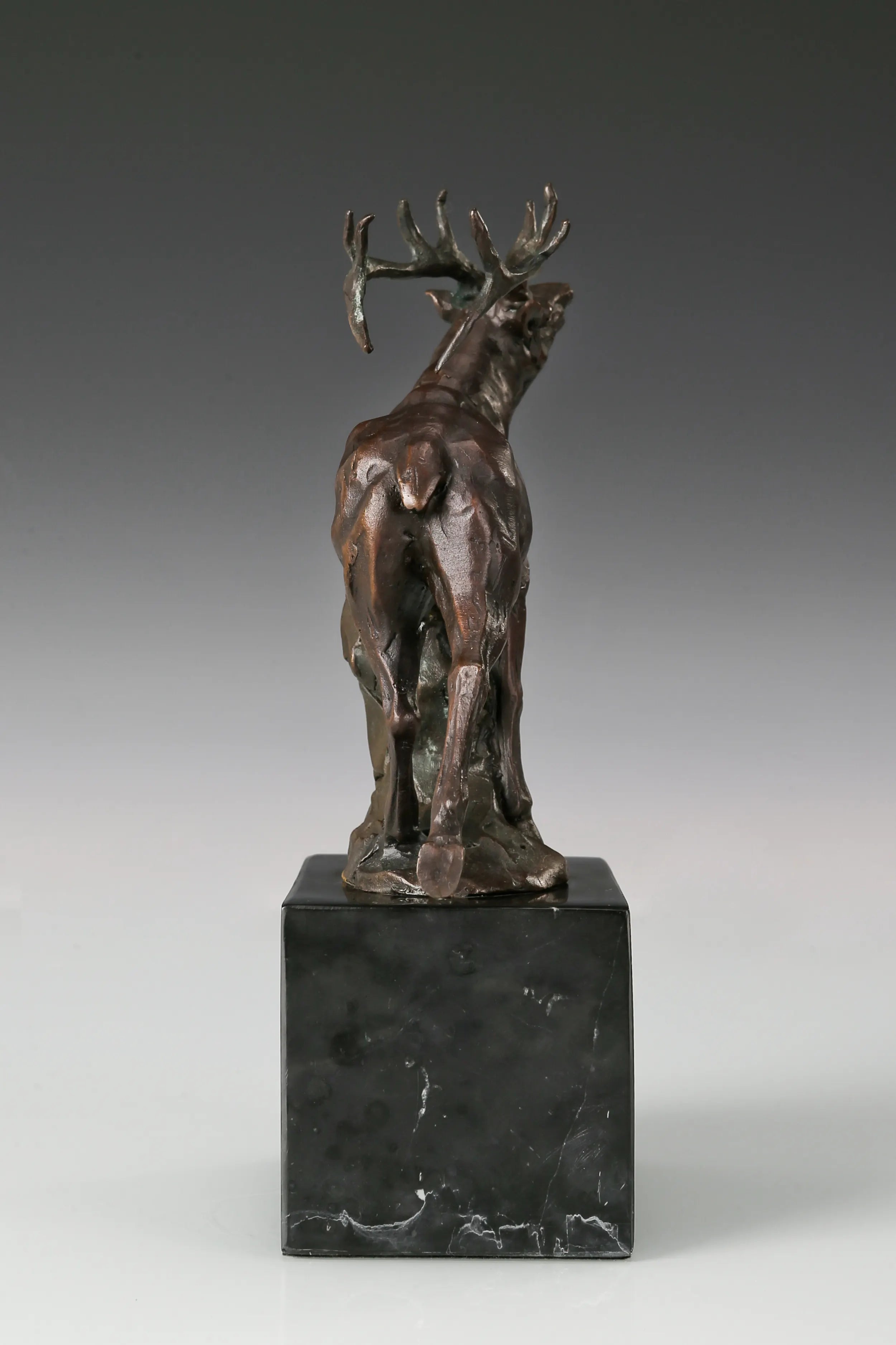 Back view of handcrafted bugling elk bronze sculpture