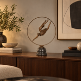 Circular Ballet Dancer bronze sculpture displayed in a refined interior