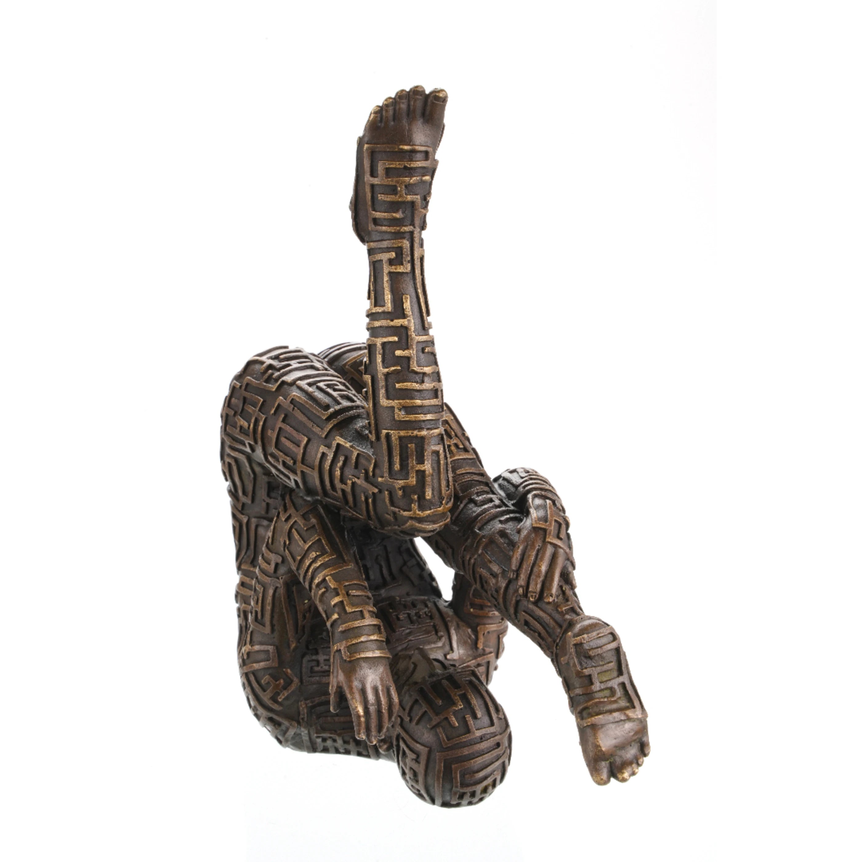 Abstract bronze sculpture of contorted human figure with maze pattern