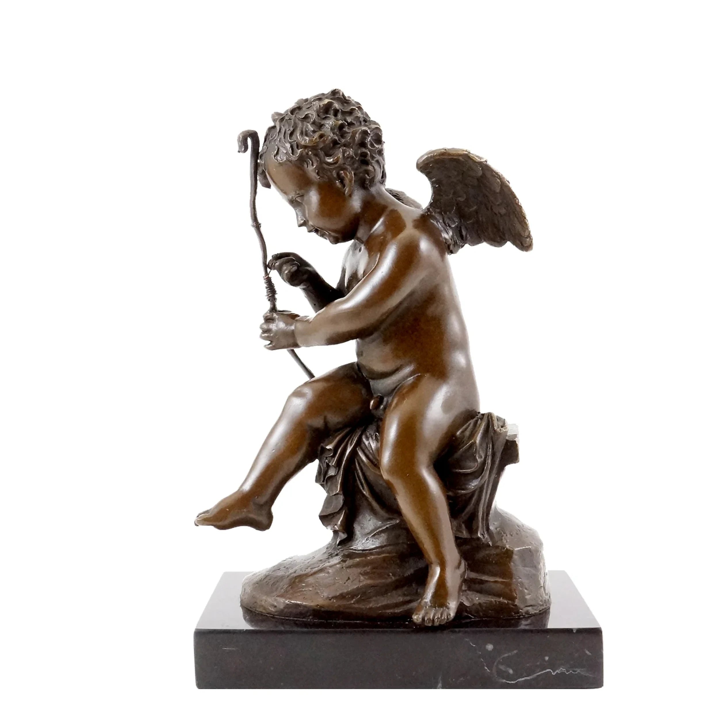 Handcrafted bronze Cupid sculpture seated while repairing his bow with detailed wings